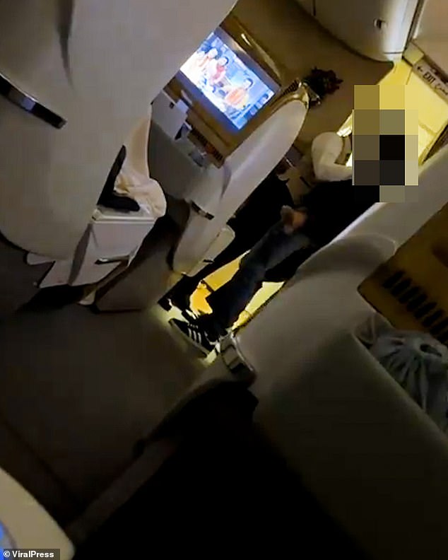 Moment drunk business class passenger headbutts an Emirates air steward