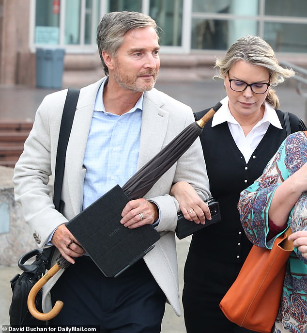 Rebecca Grossman (right) leaves court with her husband Peter Grossman