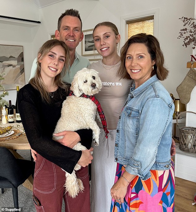Jamie Kernaghan (right) was diagnosed with a rare tumor after her symptoms were attributed to pregnancy side effects.  Pictured is her with her daughters Ellie, 17 (center right) and Isabelle, 14 (left) and her husband Steve (center left).