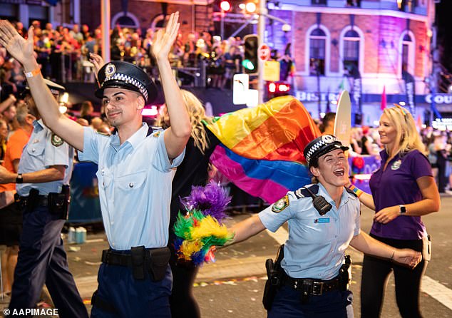 NSW Police were not invited to march at Mardi Gras for the first time in 20 years after one of their officers, Beaumont Lamarre-Condon (pictured left at Mardi Gras in 2020), allegedly killed a gay couple.