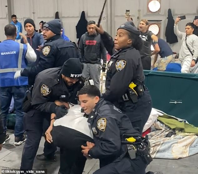 A violent confrontation between NYPD officers and migrants at the city's Randall's Island shelter center