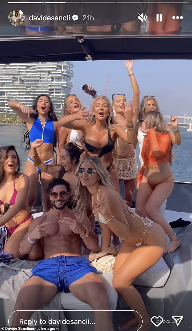 Davide Sanclimenti didn't look like he had a care in the world as he sported plenty of bikini bombshells on Thursday during a lavish vacation in Dubai.