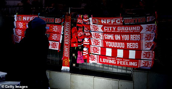 NOTTINGHAM, ENGLAND - FEBRUARY 28: A general view of street vendors' merchandise, such as half and half scarves featuring Manchester United and Nottingham Forest and scarves showing support for Nottingham Forest, can be seen before the fifth round match of the Emirates FA Cup between Nottingham Forest and Manchester United at City Ground on February 28, 2024 in Nottingham, England. (Photo by Catherine Ivill/Getty Images)
