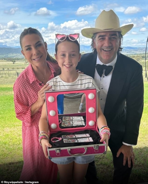 Nova's Fitzy and Wippa with Kate Ritchie made 10-year-old Swiftie cry on Friday morning after surprising her with two tickets to Taylor Swift's concert in Sydney: Pictured: Presenters Kate Ritchie and Michael 'Wippa' Wipfli with young olivia