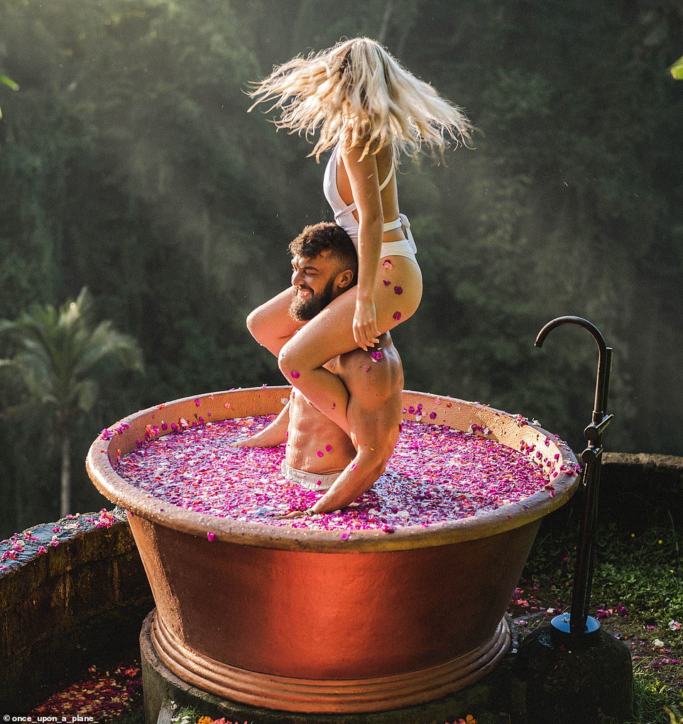 Ruan, 28, and Lee-Chazelle, 23, sold everything they own to travel together full-time and now post stunning photos online.  Here they are photographed at the stunning Villa Cella Bella in Ubud, Bali.