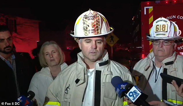 One firefighter is killed and eleven others are injured in