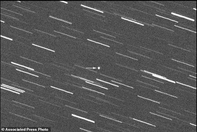 This 180-second exposure shot provided by the Virtual Telescope Project in Italy shows asteroid 2008 OS7 during its approach to Earth on January 31, 2024. Astronomers say a skyscraper-sized asteroid will pass at 1.7 million miles from Earth on Friday.  There is no chance of it hitting us since it will travel seven times the distance between the Earth and the Moon.