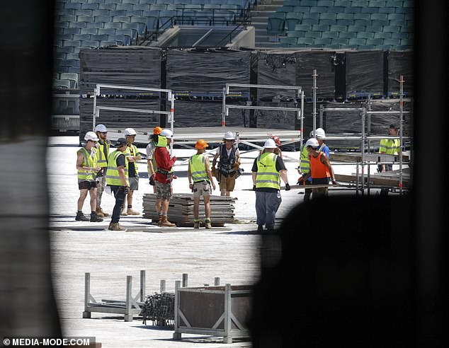 But the pop star, 34, has tried to calm her nerves with work as she prepares the stage for her first concert on the Australian leg of her Eras Tour.