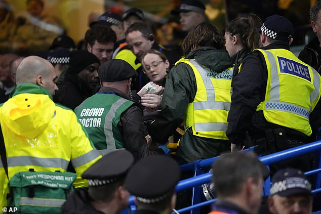 Leeds fan Aaron Cawley, 33, fell from the upper level of Stamford Bridge on Wednesday night.
