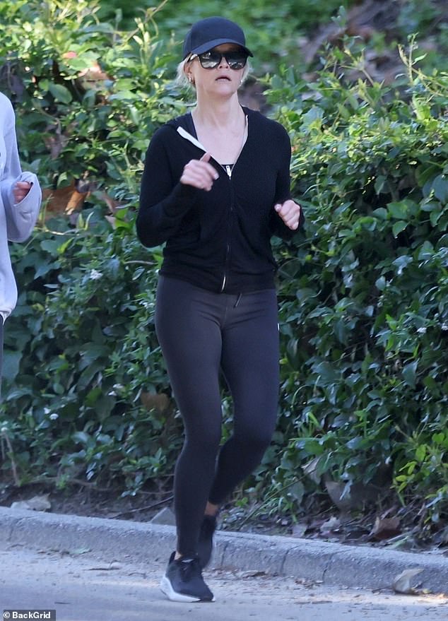 Reese Witherspoon, 47, showed off her toned body while rocking activewear during a relaxing jog in Los Angeles on Thursday.