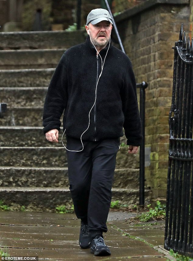 Ricky Gervais looked dejected when he was seen for the first time in Hampstead since the death of Ewen MacIntosh on Wednesday.