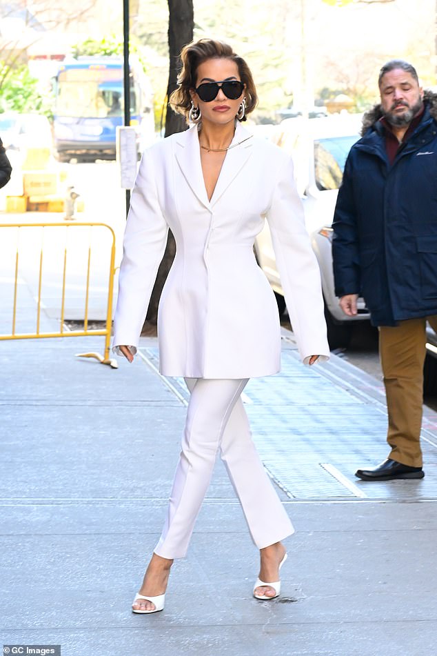 Rita Ora shows off her sense of style as she turned heads in an all-white ensemble while walking in New York City.