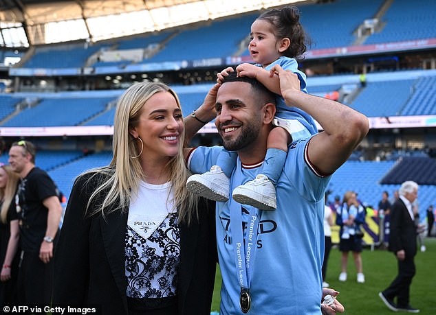Former Manchester City winger Riyad Mahrez celebrates with his wife Taylor Ward and baby daughter Mila.