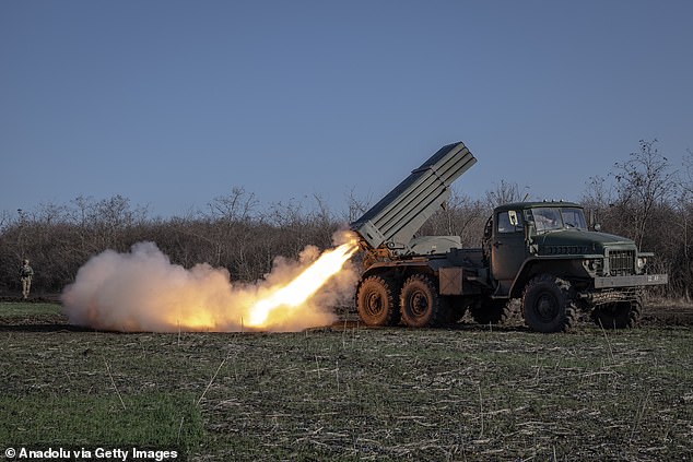 Ukrainian soldiers fire artillery at their combat position in the direction of Avdiivka, Donetsk province