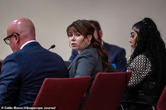 Jurors in the manslaughter trial of Rust gunsmith Hannah Gutierrez-Reed (pictured center) were shown a photo of the ammunition cart used on the set where Alec Baldwin killed cinematographer Halyna Hutchins.