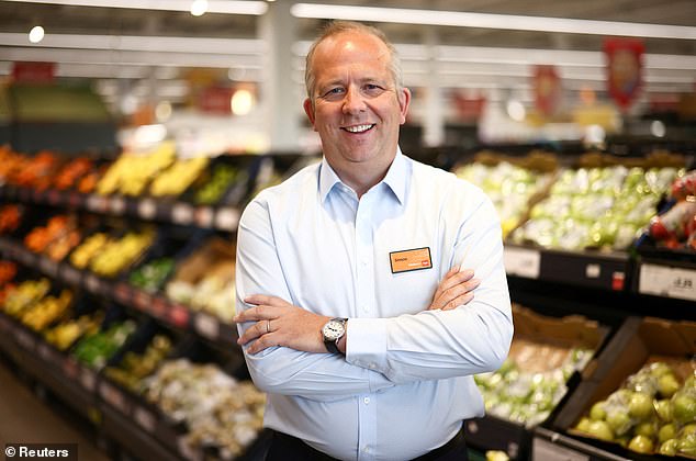 Review: Sainsbury's boss Simon Roberts (pictured) said the supermarket chain will cut costs by £1bn over three years so it can lower prices.