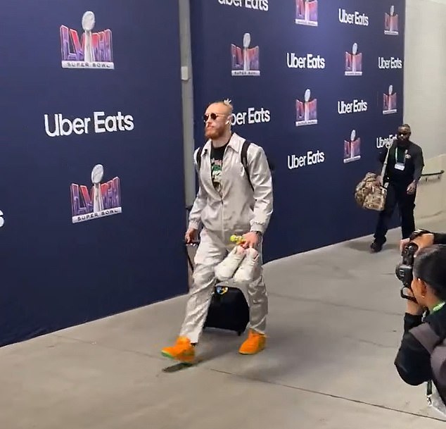 San Francisco 49ers players arrive at the Super Bowl! Christian McCaffrey wears smart black suit but George Kittle is more relaxed as they stroll into Allegiant Stadium