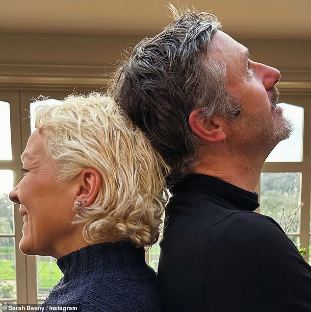 Sarah Beeny showed off her curly blonde locks while posing for an Instagram photo on Sunday with her husband Graham amid her battle with breast cancer.