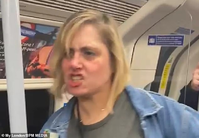 This is the shocking moment Janice Wilding launches a foul-mouthed tirade against a black passenger on the London Underground.
