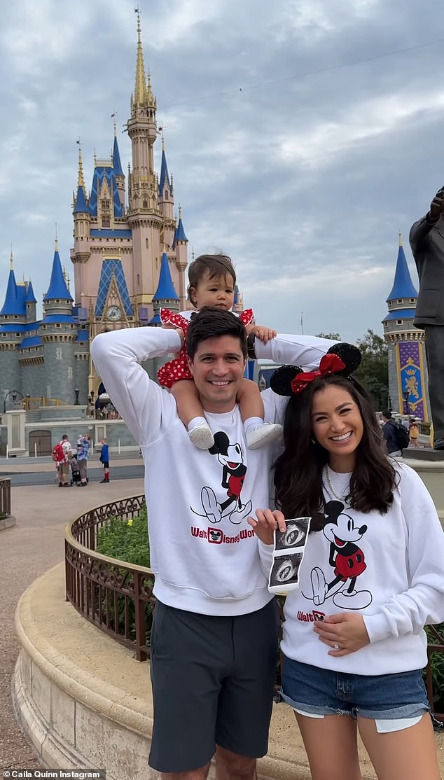Caila Quinn, 32, held up her ultrasound to announce that she and her husband Nick Burrello, 31, are expecting their second child together at Walt Disney World in Orlando, Florida.