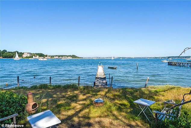 The detached property on the attractive Dorset peninsula has its own private jetty.