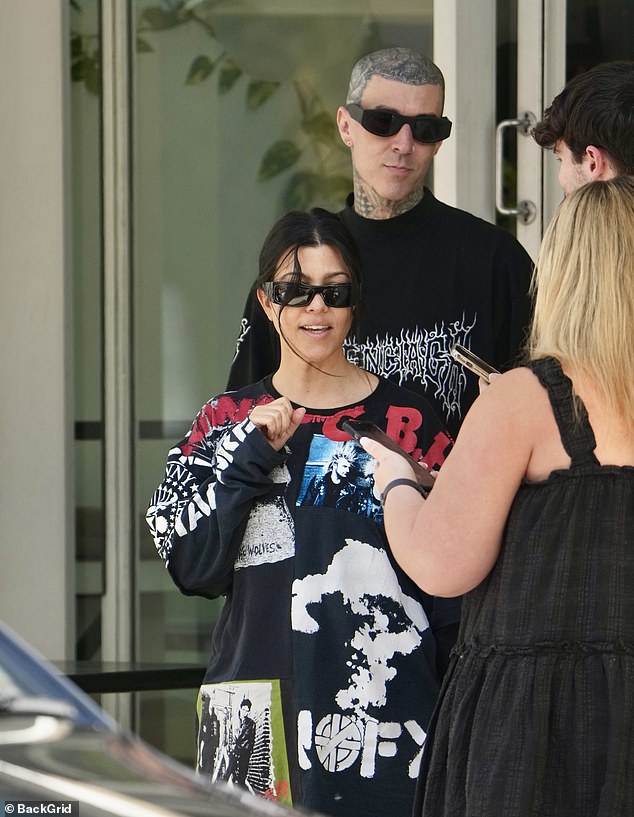 Kourtney Kardashian and Travis Barker thrilled Brisbane residents on Wednesday when they visited vegan cafe Dicki's once again.  Both in the photo