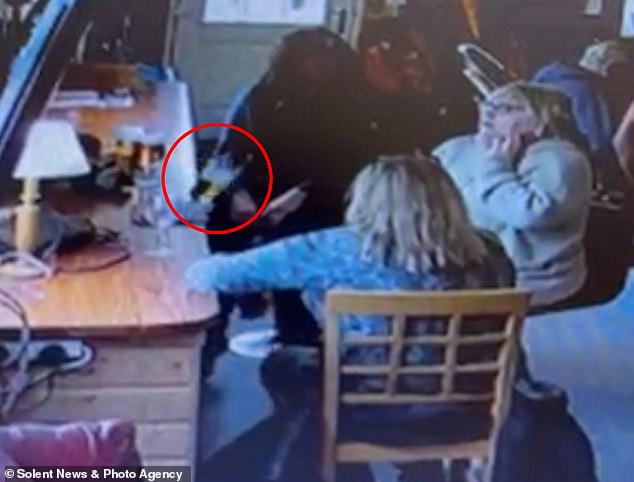 A manager has wondered if his country pub is haunted after eerie CCTV footage showed drinks sliding unaided over the edge of a bar.