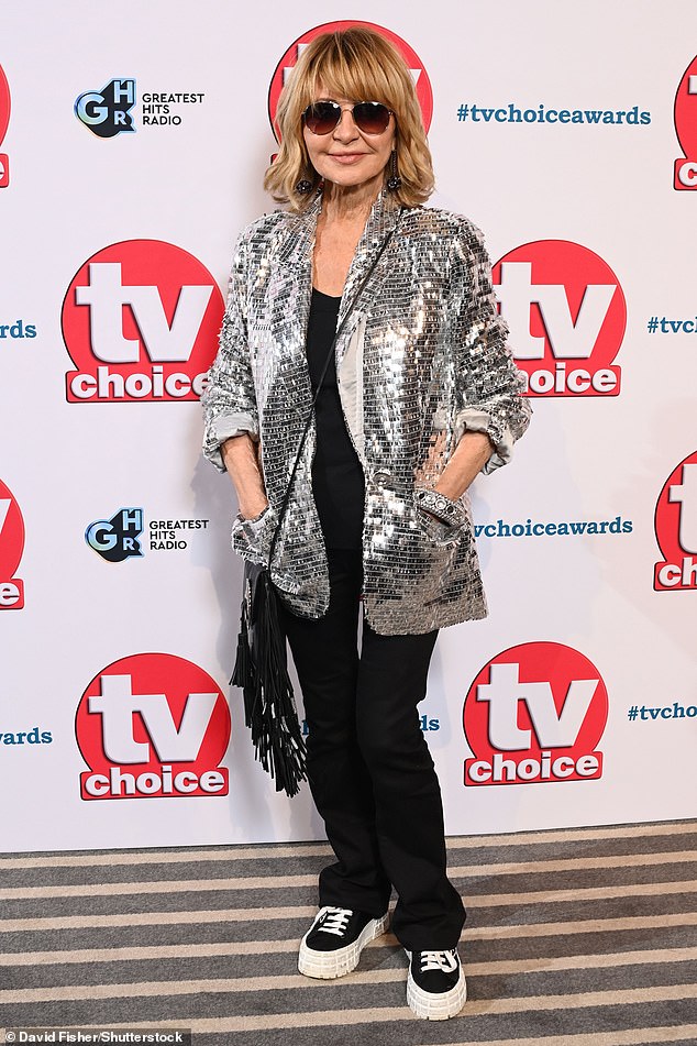 Lulu, 76, cut a stylish figure as she attended the TV Choice Awards on Monday, which were held at the London Hilton on Park Lane.