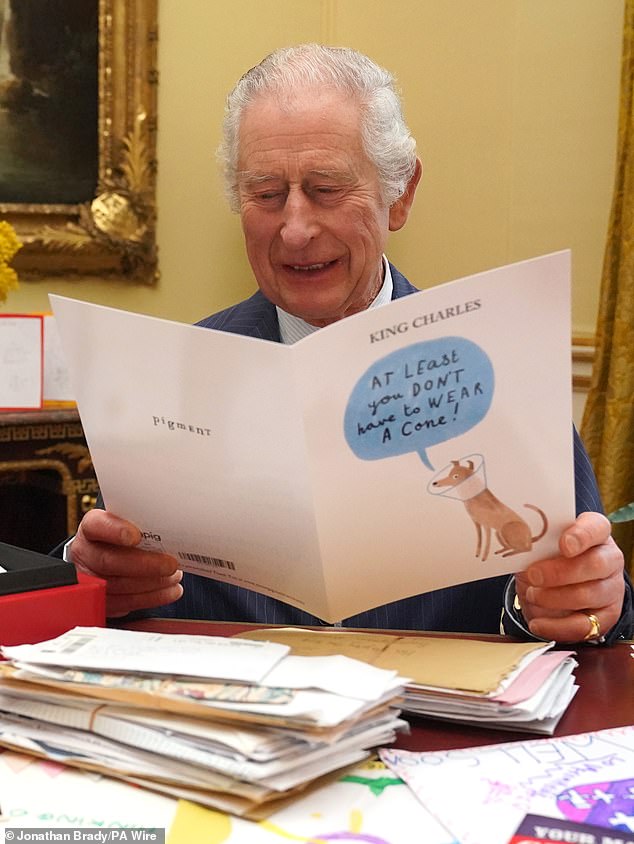 The Royal Family has released photographs and videos of King Charles reading cards sent to him by well-wishers following his cancer diagnosis.  Pictured: Her Majesty reading a card at Buckingham Palace.