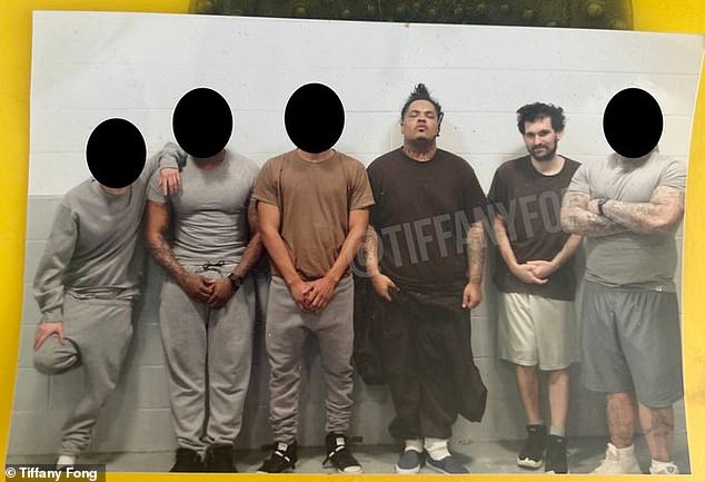 The photo, believed to have been taken on December 17, shows Bankman-Fried sporting a beard alongside former inmate G Lock, a former gang member.