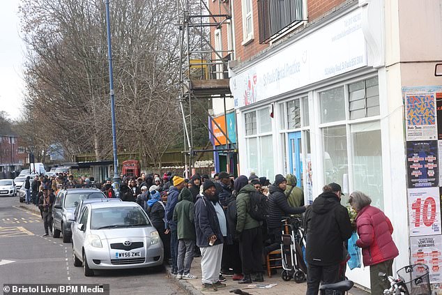 Hundreds of people were pictured queuing outside a newly opened NHS dental practice in Bristol today.