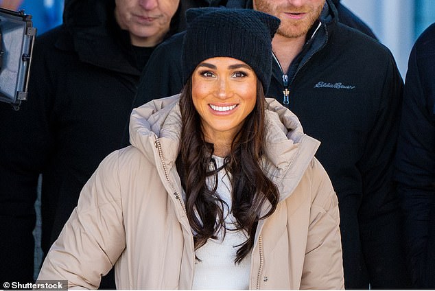 Meghan's 'chocolate brown' hair looked long and healthy on the first day at Mountain Square in Whistler