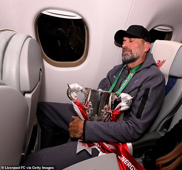 Jurgen Klopp was photographed asleep with the Carabao Cup in hand after his team defeated Chelsea