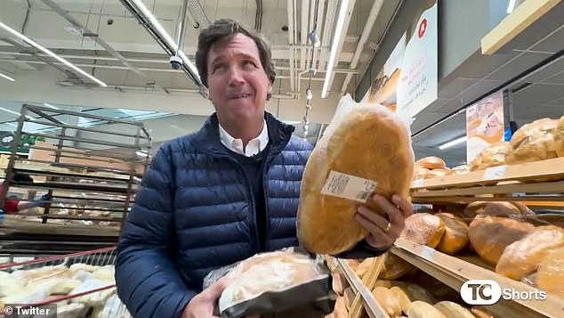 Tucker Carlson in a Russian supermarket while fawning over the low price of 