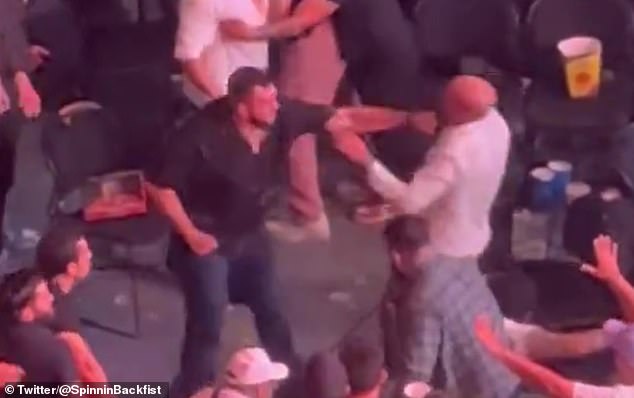 The incident escalated with one fan felled by a viscous left hook from another.