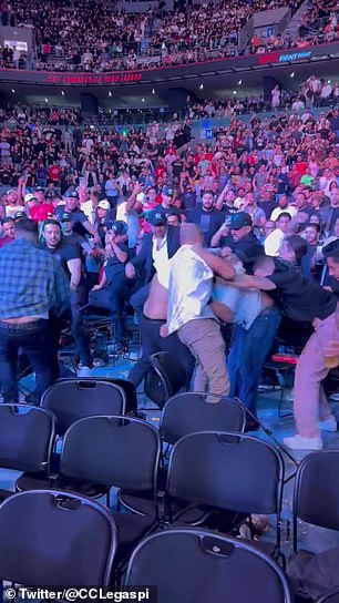 While a massive fight broke out in the crowd during the UFC event in Mexico City on Saturday.