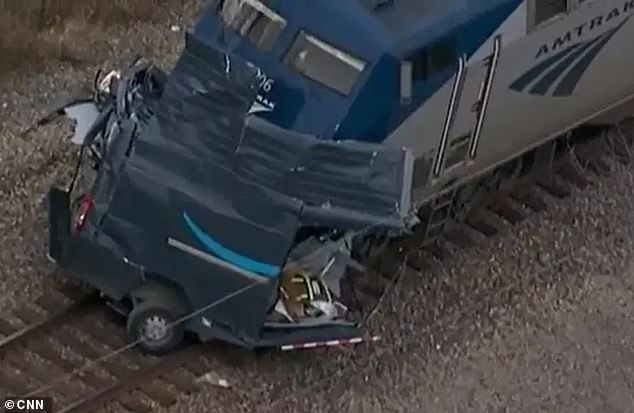 Amazon truck crushed by train