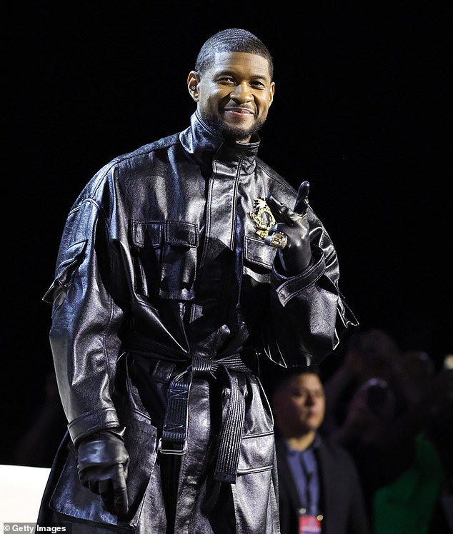 Usher speaks on stage during the Super Bowl LVIII press conference at the Mandalay Bay Convention Center on February 8, 2024 in Las Vegas.