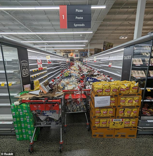 Coles shoppers in Victoria were shocked to see aisles full of discarded frozen food (pictured) after severe storms hit the state and caused power outages on Tuesday.