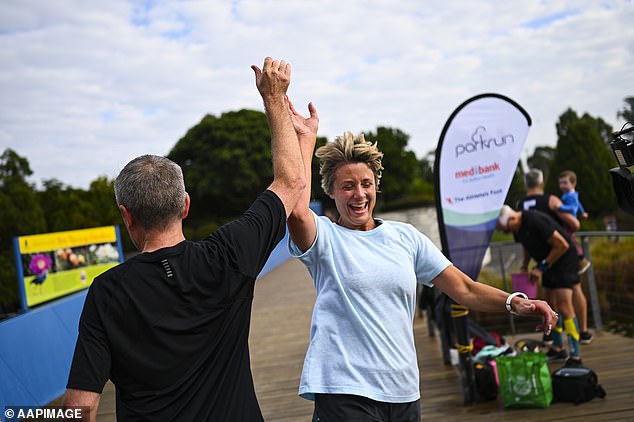 Parkrun, a global sport with millions of participants, has attracted attention after removing speed-based records from its website (pictured is Australian politician Kristina Keneally completing an event in 2019).