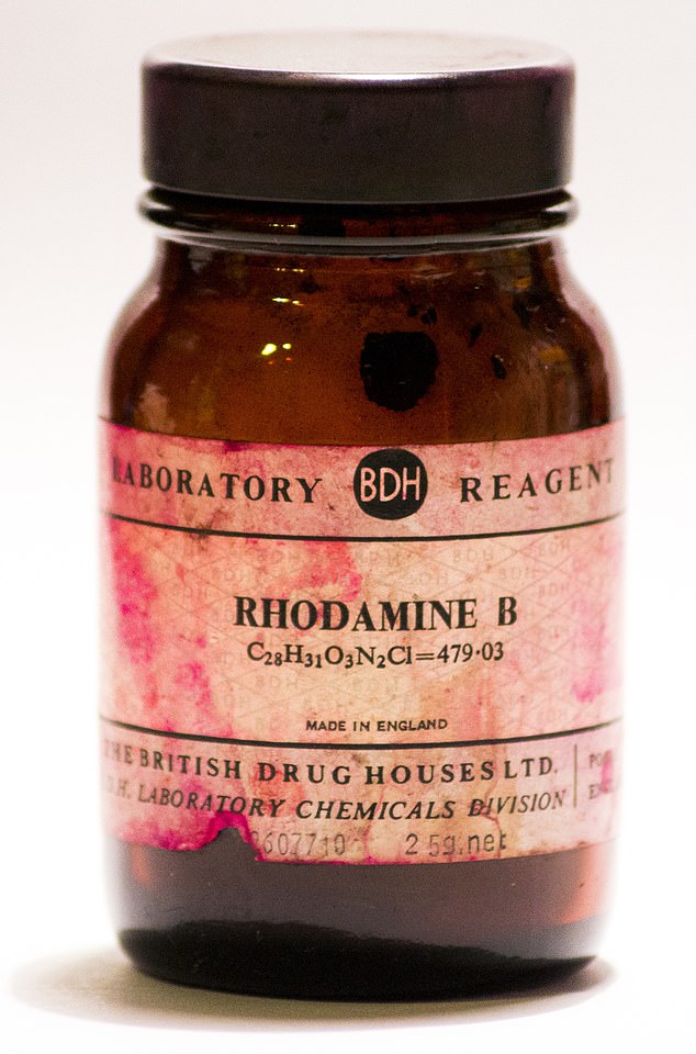 Rhodamine B appears green in powder form, but when added to water it turns a vivid fluorescent pink color.  It is also used for cosmetics, textile dyes and inks.  In the UK it is commonly used to stain slides in laboratories and in the wastewater industry to help locate leaks in drains.