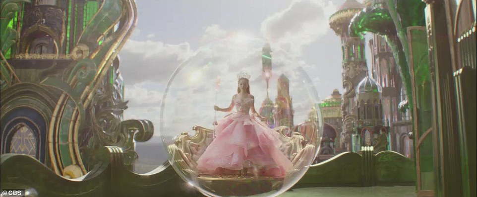 The first trailer for Wicked was shared at the start of Sunday's Super Bowl.  Ariana Grande was seen in her rose gold dress as Glinda the Good Witch.  She was wielding Glinda's recognizable star-shaped wand, a billowing dress with puffed sleeves and a crown.