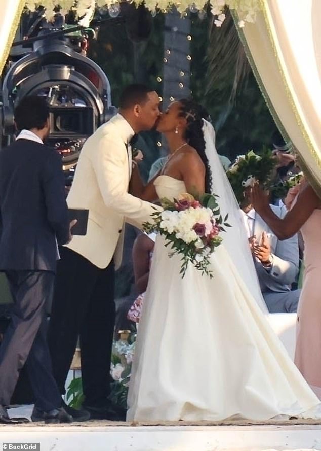 Will Smith kissed his on-screen star Melanie Liburd while filming a wedding scene on the set of Bad Boys 4 in Miami on Saturday.