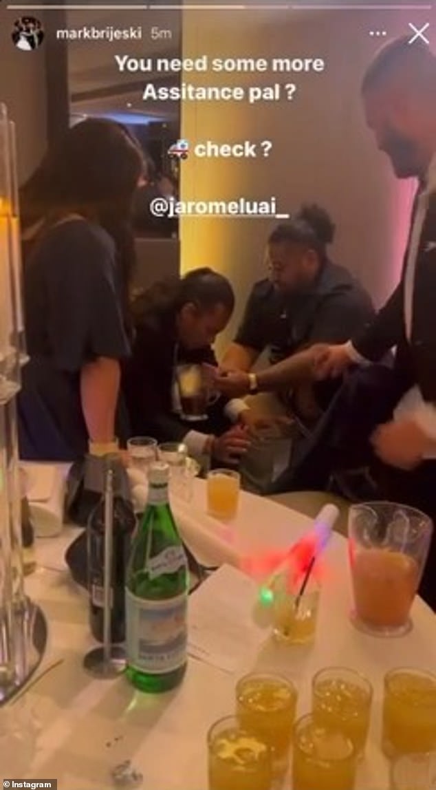 Soccer star Jarome Luai appeared to vomit into a jug during a night out