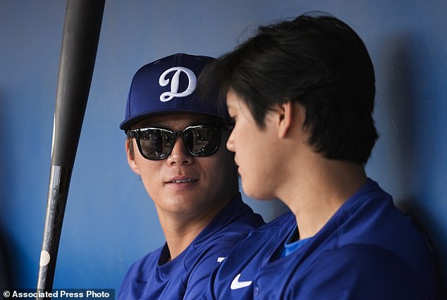 Yamamoto, left, and designated hitter Shohei Ohtani signed massive contracts with Los Angeles this year.