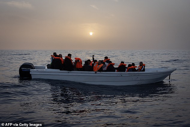 Migrants from Syria and Bangladesh are rescued on a boat off the coast of Libya in January this year.