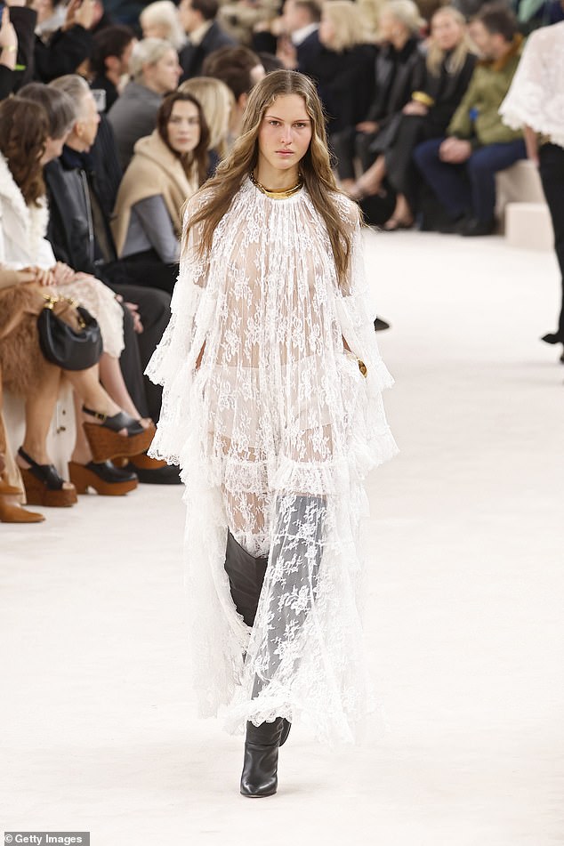 Much of the Chloe collection left the models' breasts exposed, like in this white lace design.