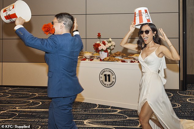The couple said the wedding was a hit with their guests, who loved the KFC merchandise and personalized buckets.