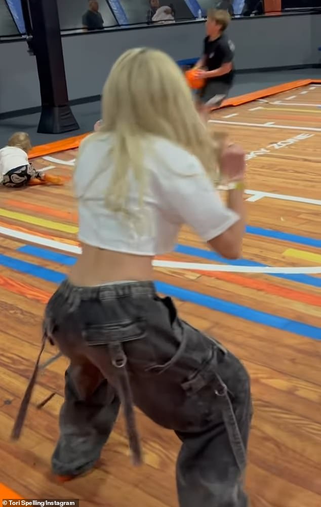 The Beverly Hills 90210 alum sparked outrage after posting a clip to her Instagram showing off her hot dance moves in the middle of a practice gym.
