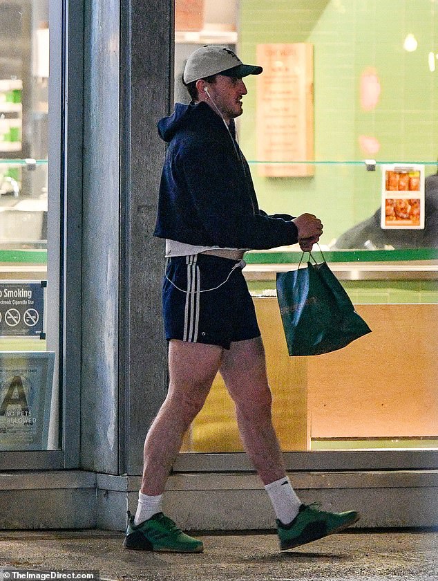 The Normal People hunk, 28, had a bite to eat after hitting the gym. Paul, known for experimenting with fashion, wore the shorts with a cropped hoodie and a cap.